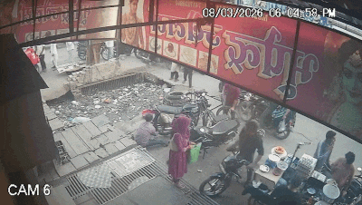 हापुड़ में बड़ा हादसा: खुले नाले में बाइक समेत गिरा परिवार, CCTV में कैद हुई घटना