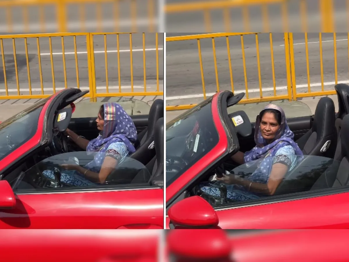 सूट-सलवार और दुपट्टा पहनकर लाल रंग की Porsche 718 Boxster चलाती कंटेंट क्रिएटर निक्की दहिया। | Source: Social media